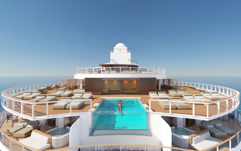 Norwegian Prima: Deck superior do navio, classe The Haven, com piscina de borda infinita e cadeiras espreguiçadeiras
